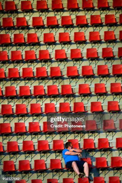 Lonely Waasland - Beveren supporter in the stands during the Jupiler Pro League Play - Off 2A match between SV Zulte Waregem and Waasland-Beveren at...