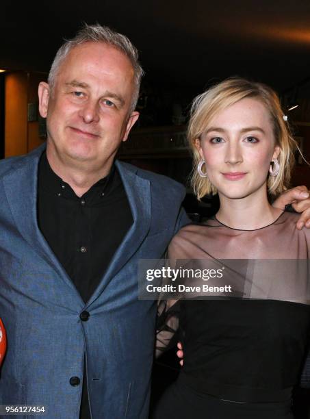 Director Dominic Cooke and Saoirse Ronan attends a special screening of "On Chesil Beach" at The Curzon Mayfair on May 8, 2018 in London, England.