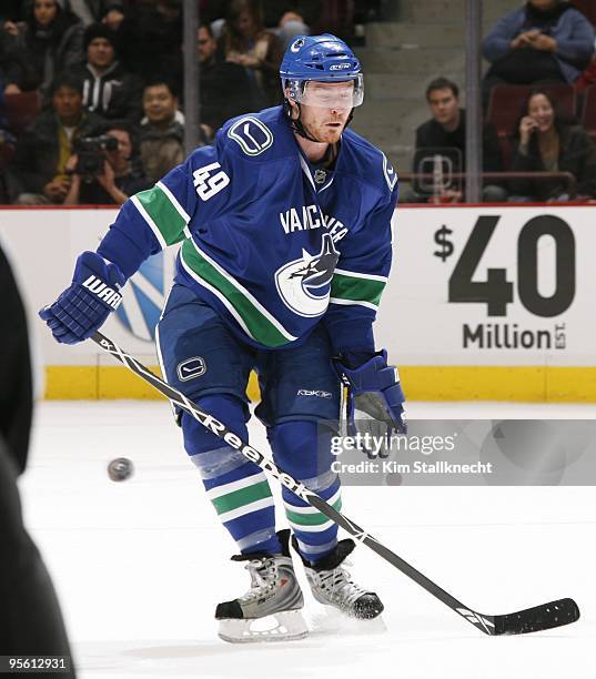 Alexandre Bolduc of the Vancouver Canucks deflects the puck during the game against the Columbus Blue Jackets at General Motors Place on January 5,...