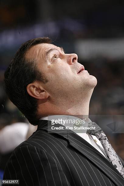 Vancouver Canucks head coach Alain Vigneault watches the replay against the Columbus Blue Jackets at General Motors Place on January 5, 2010 in...