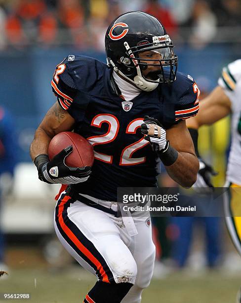 Matt Forte of the Chicago Bears runs against the Green Bay Packers at Soldier Field on December 13, 2009 in Chicago, Illinois. The Packers defeated...