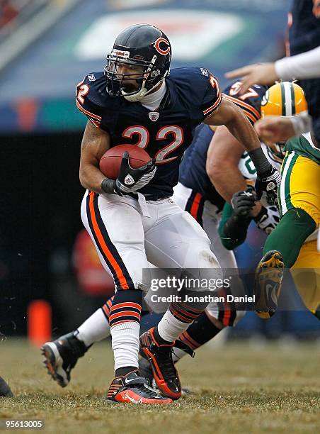 Matt Forte of the Chicago Bears runs against the Green Bay Packers at Soldier Field on December 13, 2009 in Chicago, Illinois. The Packers defeated...