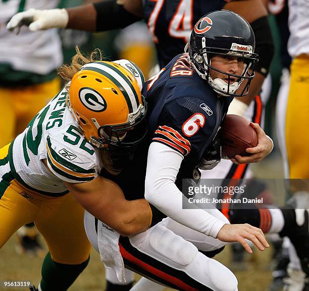 Clay Matthews of the Green Bay Packers sacks Jay Cutler of the Chicago Bears at Soldier Field on December 13, 2009 in Chicago, Illinois. The Packers...