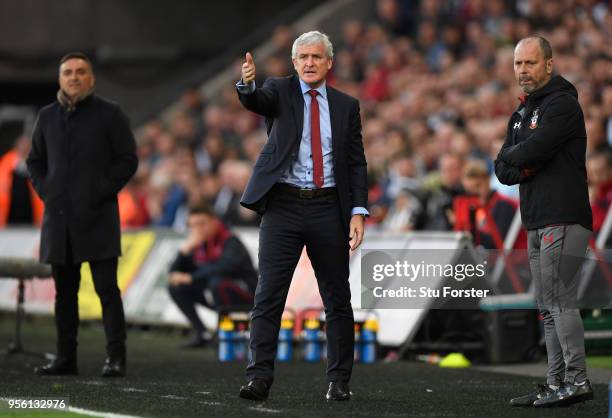 Southampton manager Mark Hughes reacts during the Premier League match between Swansea City and Southampton at Liberty Stadium on May 8, 2018 in...