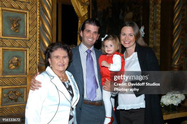 Marie Zelnickova stands with her grandson Donald Trump, Jr and his first daughter Kai Madison, and wife Vanessa Kay Haydon at the Mar-A-Lago estate,...