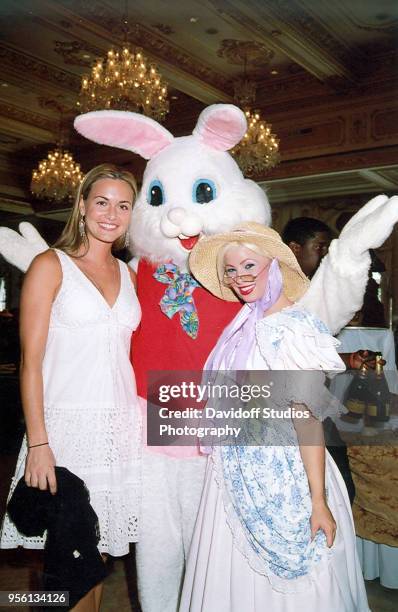 Vanessa Kay Haydon Trump, wife of Donald Trump Jr, stands next to the Easter Bunny and another costumed Easter character during Easter Sunday events...