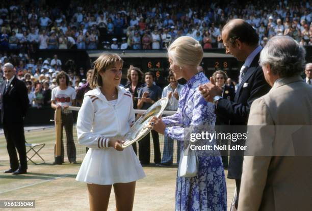 Chris Evert victorious, receiving Venus Rosewater Dish from HRH Katharine, Duchess of Kent and HRH Prince Edward, the Duke of Kent after winning...