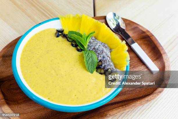 healthy breakfast with pineapple smoothie, chia seeds pudding, blueberry and fresh pineapple - chiasamen stock-fotos und bilder