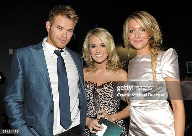 Actor Kellan Lutz, singer Carrie Underwood and actress Katie Cassidy backstage during the People's Choice Awards 2010 held at Nokia Theatre L.A. Live...