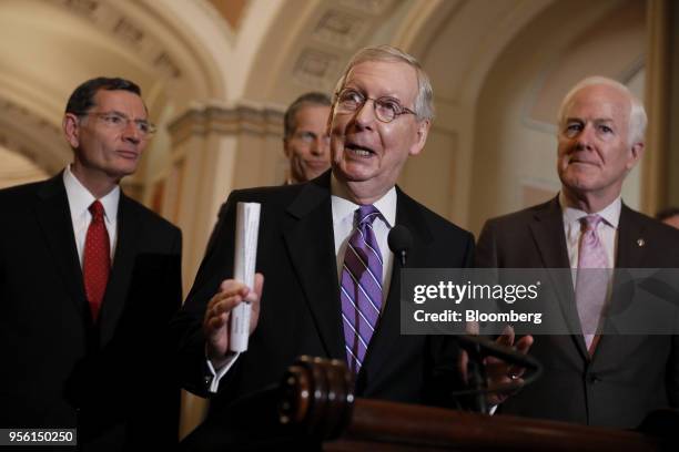 Senate Majority Leader Mitch McConnell, a Republican from Kentucky, center, speaks during a news conference after a Senate Republican weekly luncheon...