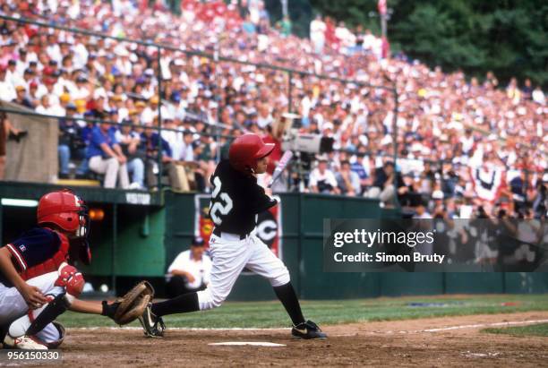 Little League World Series: Toms River's Chris Cardone in action, at bat, hitting home run vs Japan at Volunteer Stadium. Williamsport, PA 8/29/1998...