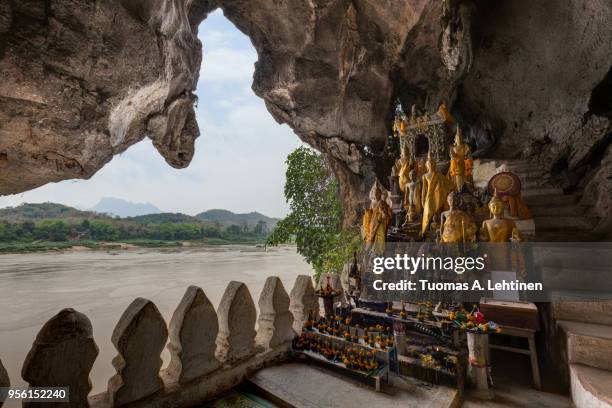 mekong river and pak ou caves in laos - pak ou caves stock pictures, royalty-free photos & images