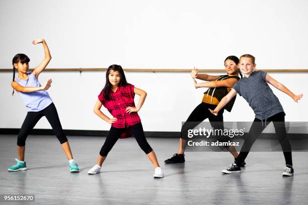 hip-hop dance group of young diverse girls - logic rapper stock pictures, royalty-free photos & images