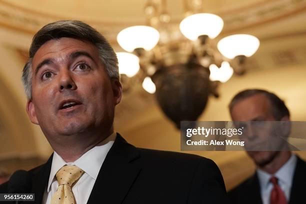 Sen. Cory Gardner speaks as Sen. John Thune listens during a news briefing after a weekly Senate Republican Policy Luncheon at the Capitol May 8,...