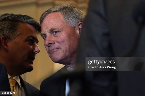 Sen. Richard Burr listens to Sen. Cory Gardner during a news briefing after a weekly Senate Republican Policy Luncheon at the Capitol May 8, 2018 in...
