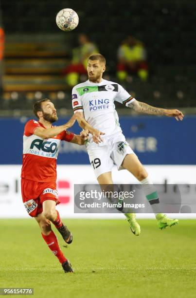 Samy Kehli of OH Leuven in action with Idir Ouali of KV Kortrijk during the Belgian First Division A Europa League Playoff tie between OH Leuven and...