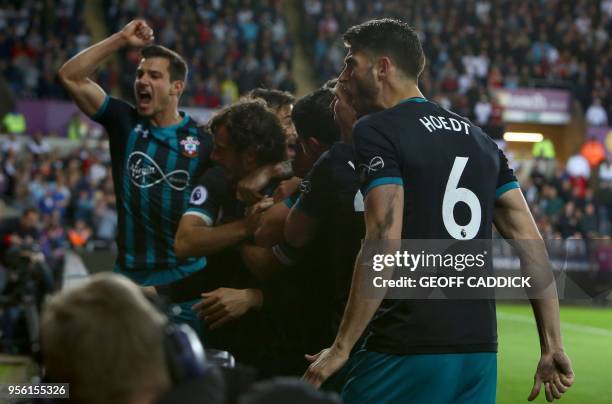 Southampton's Italian striker Manolo Gabbiadini celebrates scoring his team's first goal during the English Premier League football match between...