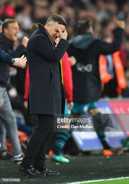 Carlos Carvalhal, Manager of Swansea City looks dejected after Southampton score their first goal during the Premier League match between Swansea...