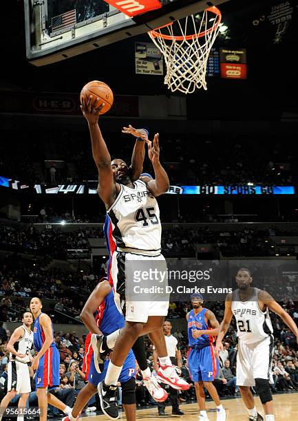 DeJuan Blair of the San Antonio Spurs shoots against Ben Wallace of the Detroit Pistons on January 6, 2010 at the AT&T Center in San Antonio, Texas....