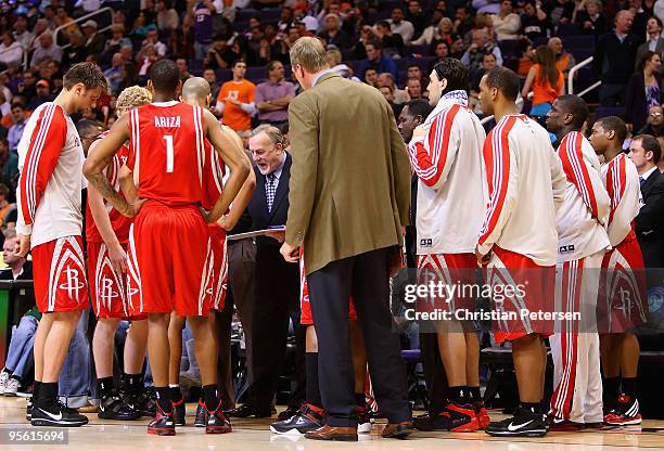 Head coach Rick Adelman of the Houston Rockets directs his team during a time out from the NBA game against the Phoenix Suns at US Airways Center on...