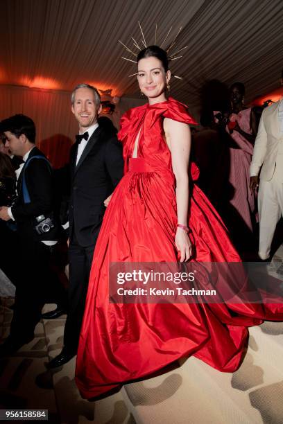 Adam Shulman and Anne Hathaway attend the Heavenly Bodies: Fashion & The Catholic Imagination Costume Institute Gala at The Metropolitan Museum of...