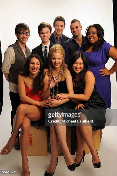 Actors Kevin McHale, Chris Colfer, Cory Monteith, Mark Salling, Amber Riley, Lea Michele, Dianna Agron, Jenna Ushkowitz pose for a portrait during...