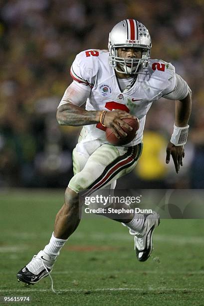 Quarterback Terrelle Pryor of the Ohio State Buckeyes runs with the ball against the Oregon Ducks during the 96th Rose Bowl game on January 1, 2010...