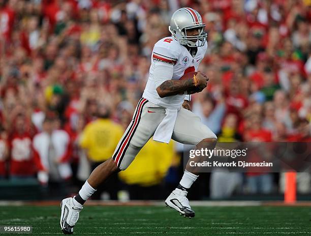 Quarterback Terrelle Pryor of the Ohio State Buckeyes runs with the ball against the Oregon Ducks during the 96th Rose Bowl game on January 1, 2010...