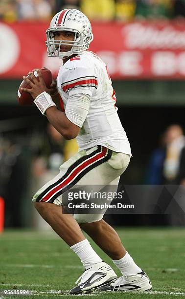 Quarterback Terrelle Pryor of the Ohio State Buckeyes drops back to pass against the Oregon Ducks during the 96th Rose Bowl game on January 1, 2010...