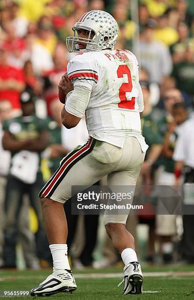 Quarterback Terrelle Pryor of the Ohio State Buckeyes drops back to pass against the Oregon Ducks during the 96th Rose Bowl game on January 1, 2010...