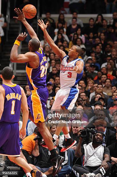 Sebastian Telfair of the Los Angeles Clippers goes up for a shot against DJ Mbenga of the Los Angeles Lakers at Staples Center on January 6, 2010 in...