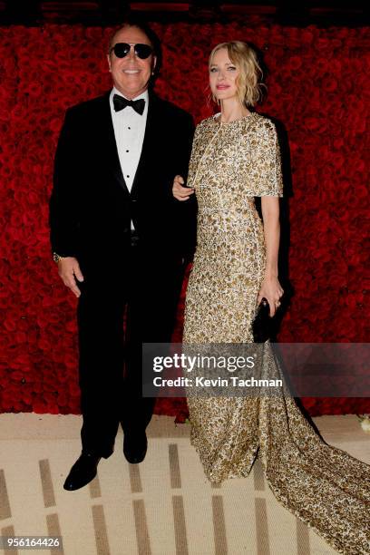 Michael Kors and Naomi Watts attend the Heavenly Bodies: Fashion & The Catholic Imagination Costume Institute Gala at The Metropolitan Museum of Art...