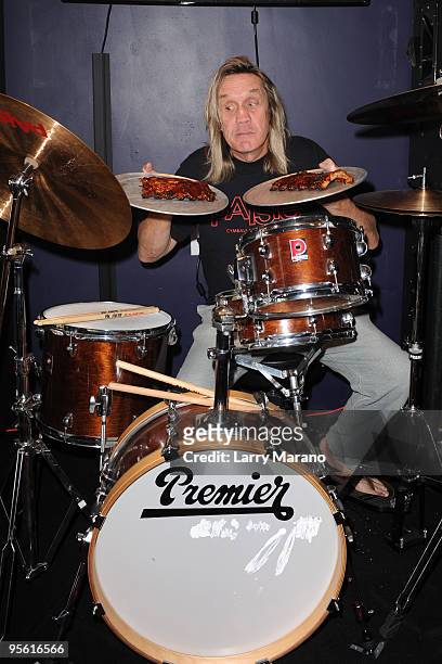Nicko McBrain of Iron Maiden poses at his restaurant ''Rock N Roll Ribs'' on January 6, 2010 in Coral Springs, Florida.