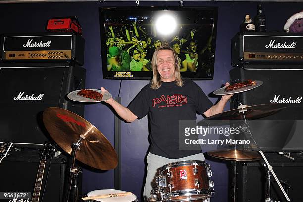 Nicko McBrain of Iron Maiden poses at his restaurant ''Rock N Roll Ribs'' on January 6, 2010 in Coral Springs, Florida.