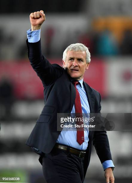 Mark Hughes, Manager of Southampton celebrates during the Premier League match between Swansea City and Southampton at Liberty Stadium on May 8, 2018...