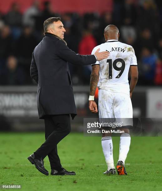 Carlos Carvalhal, Manager of Swansea City consols Andre Ayew during the Premier League match between Swansea City and Southampton at Liberty Stadium...