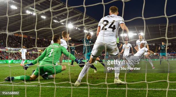 Southampton striker Manolo Gabbiadini fires in the winning goal during the Premier League match between Swansea City and Southampton at Liberty...
