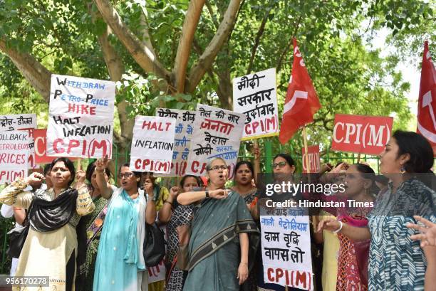 Workers protest against the central government over the issue of fuel prices hike near Jantar Mantar on May 8, 2018 in New Delhi, India. The prices...