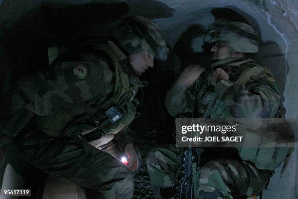 French soldiers of the Operational Mentoring and Liaison Teams sleep in a shelter during a mortar alert at the Tagab-Kutschbach Forward opérating...