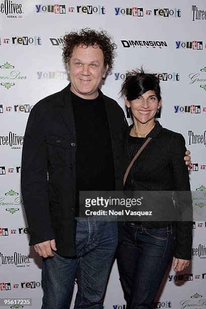 John C. Reilly and his wife Alison Dickey attend the premiere of ''Youth In Revolt'' at Mann Chinese 6 on January 6, 2010 in Los Angeles, California.