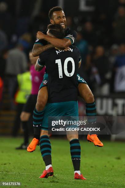 Southampton's English striker Charlie Austin and Southampton's English defender Ryan Bertrand celebrate following the English Premier League football...