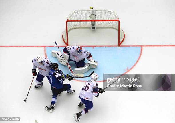 Lars Haugen, goaltender of Norway tends net against Veli Matti Savinainen of Finland during the 2018 IIHF Ice Hockey World Championship group stage...