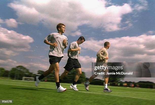 New signings Junichi Inamoto and Francis Jeffers of Arsenal go on a gentle jog during an Arsenal training session held in Colney, England. \...