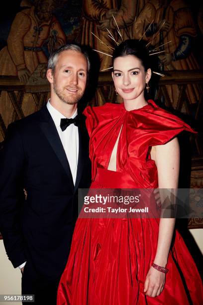 Adam Shulman and Anne Hathaway attend Heavenly Bodies: Fashion & The Catholic Imagination Costume Institute Gala at The Metropolitan Museum of Art on...