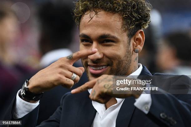 Paris Saint-Germain's Brazilian forward Neymar Jr gestures at the end of the French Cup final football match between Les Herbiers and Paris...