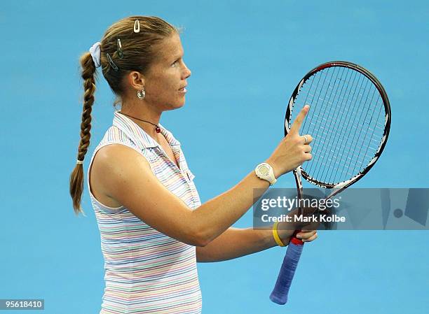 Melinda Czink of Hungary shows her frustration after a close line call in her quarter final match against Justine Henin of Belgium during day five of...