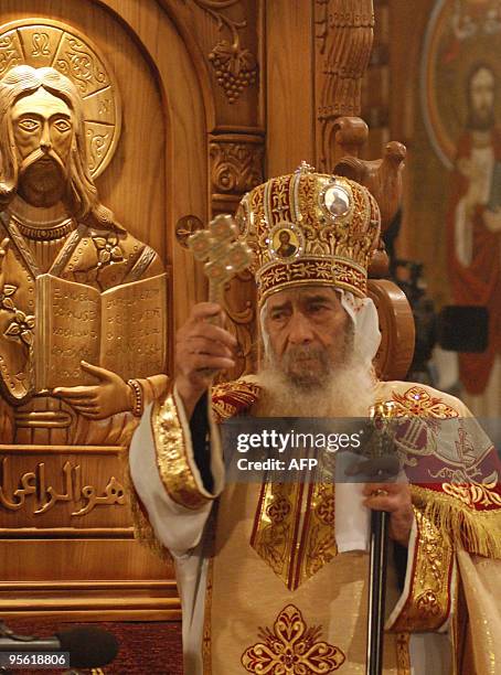 Pope Shenuda III, the head of the Egyptian Coptic Orthodox church, leads the Christmas midnight mass, celebrated along with Orthodox communities...