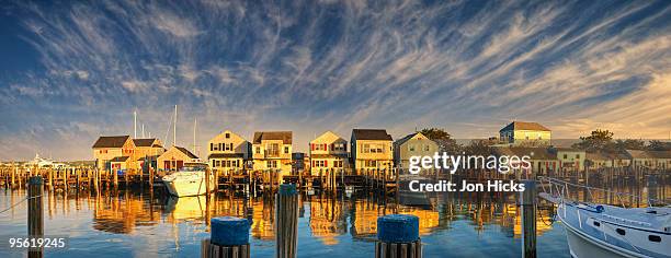 a wharf in nantucket harbour - nantucket foto e immagini stock