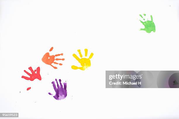 bills of colorful children - paint handprint stock pictures, royalty-free photos & images