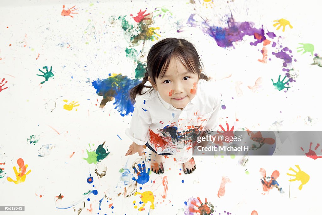 Children Making Handprints With Paint